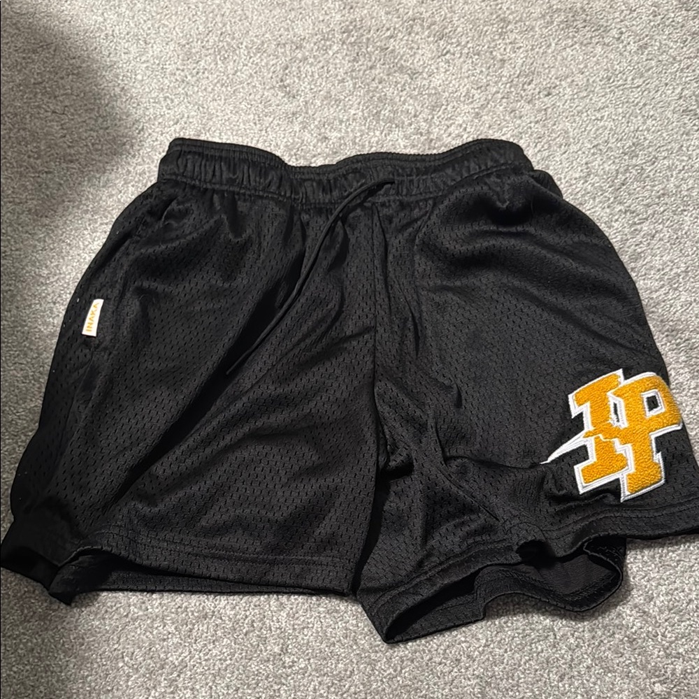 Inaka black with yellow logo shorts